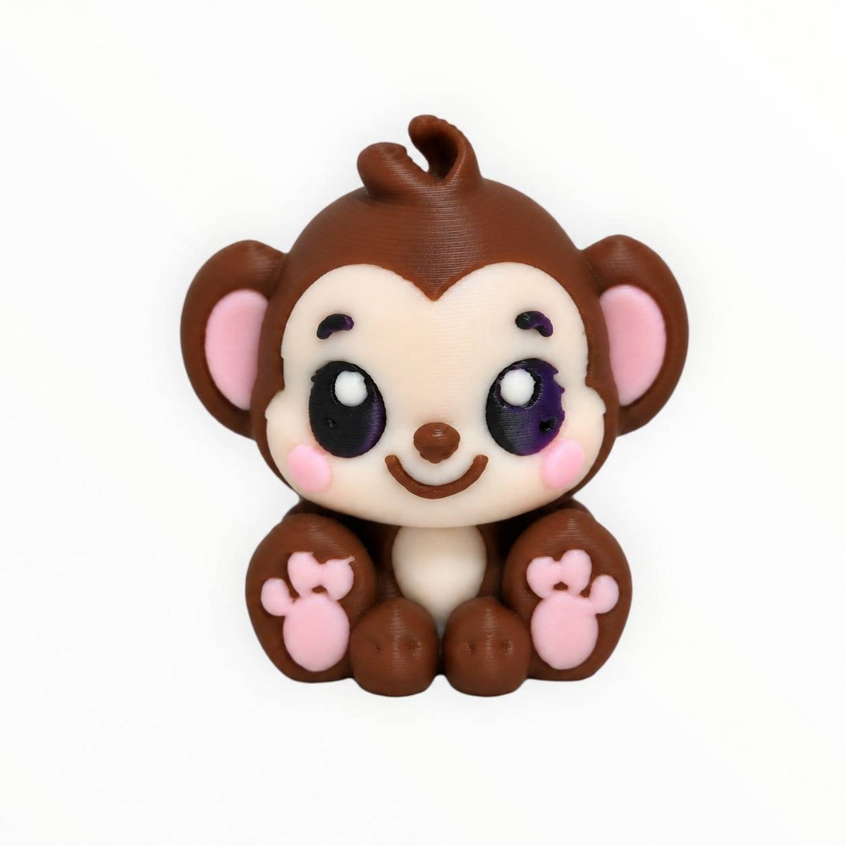 Monkey Business 3D printed monkey bead featuring a cute sitting brown monkey with large sparkling eyes, pink cheeks, round ears, curled hair, and pink paw pads.