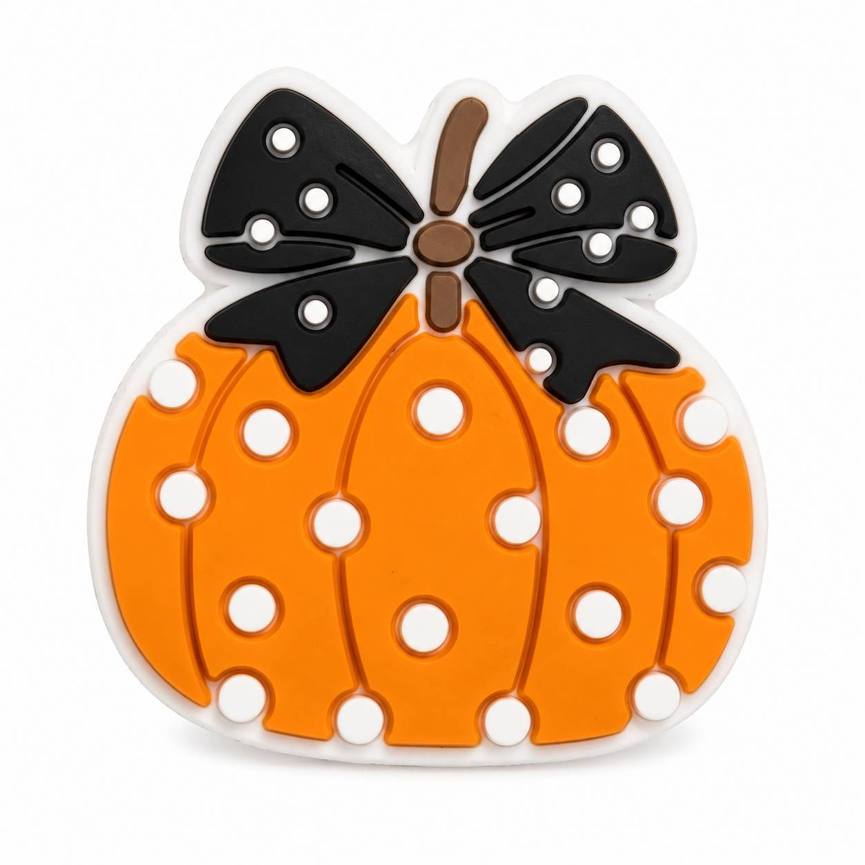 Orange polka dot pumpkin focal bead with a black bow, perfect for Halloween and fall crafts.