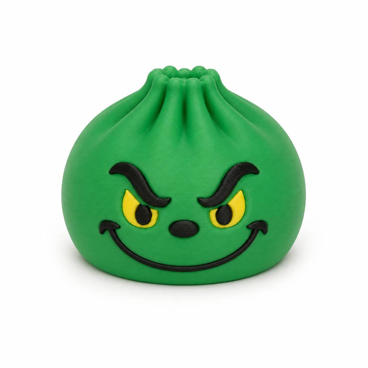Green Mean One Dumpling 3D printed holiday bead with yellow eyes and mischievous smile by Bailey’s Beads.