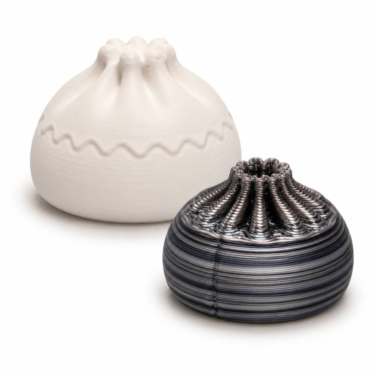 Moonstone silver gray and charcoal 22mm Mini Dumpling 3D printed bead shown with Original Dumpling for size comparison