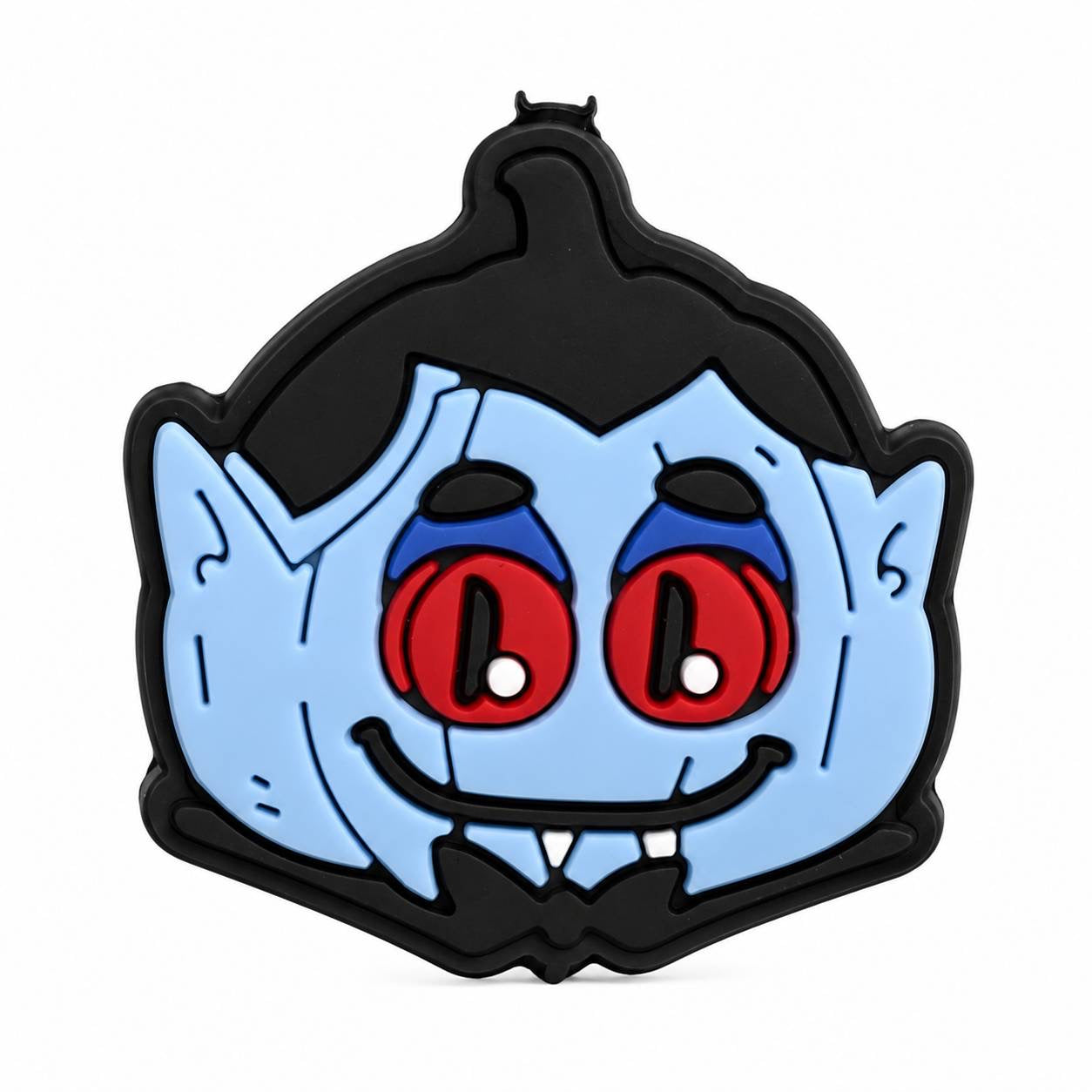 Cute vampire Halloween focal bead featuring red eyes, tiny fangs, and a playful smile.