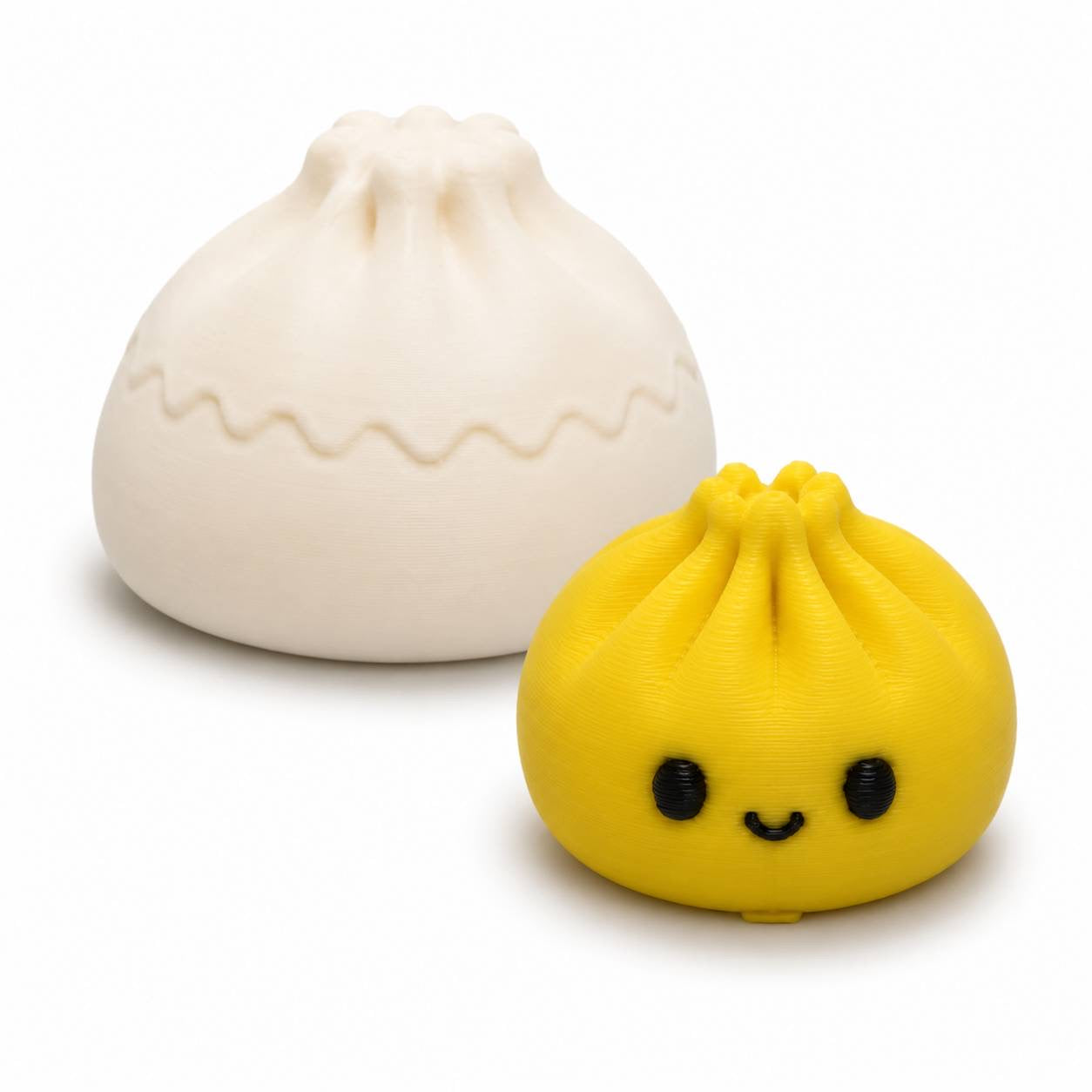 Yellow 22mm Mini Dumpling 3D printed bead shown with Original Dumpling for size comparison