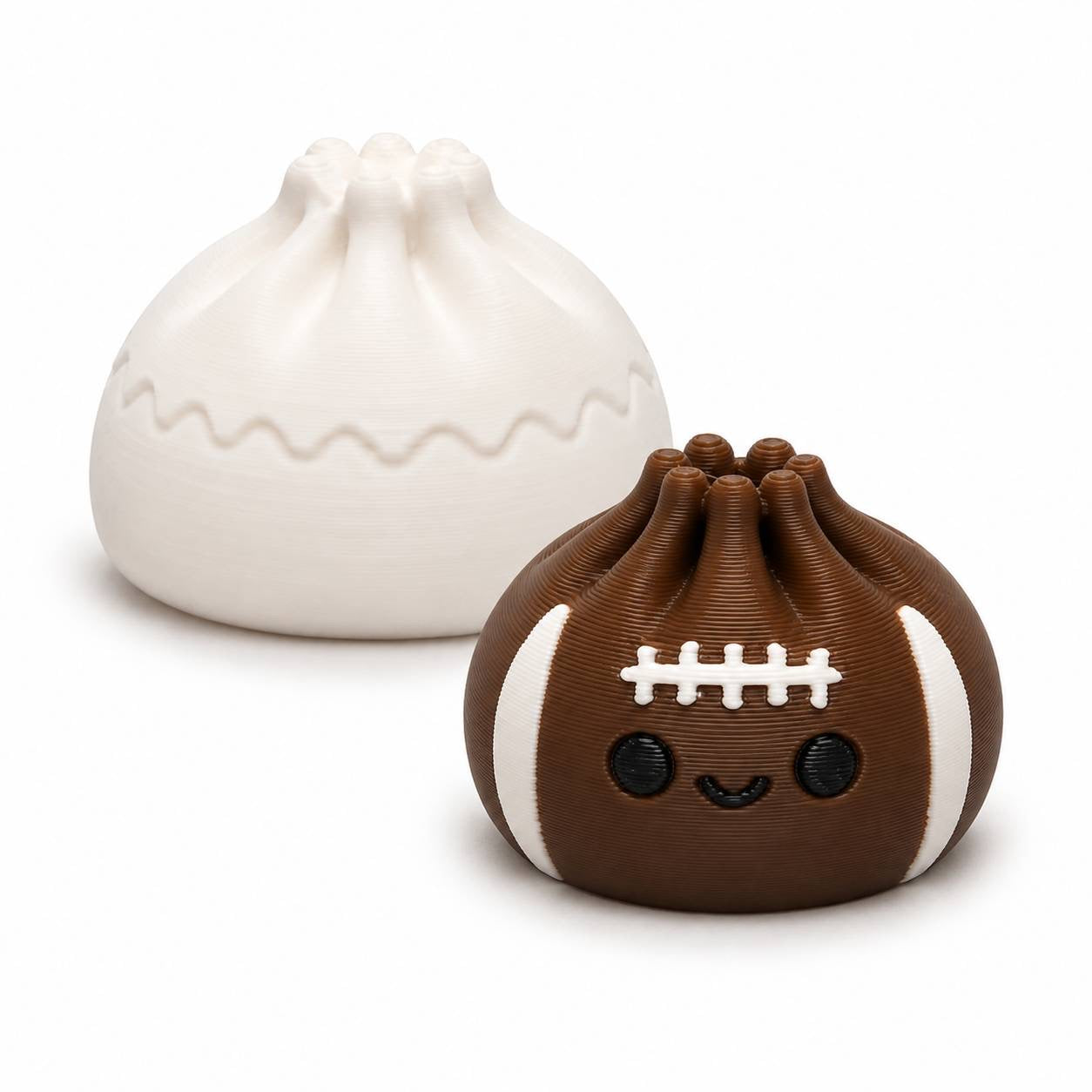 Brown and white Football Mini Dumpling 22mm 3D printed bead shown with larger Dumpling for size comparison