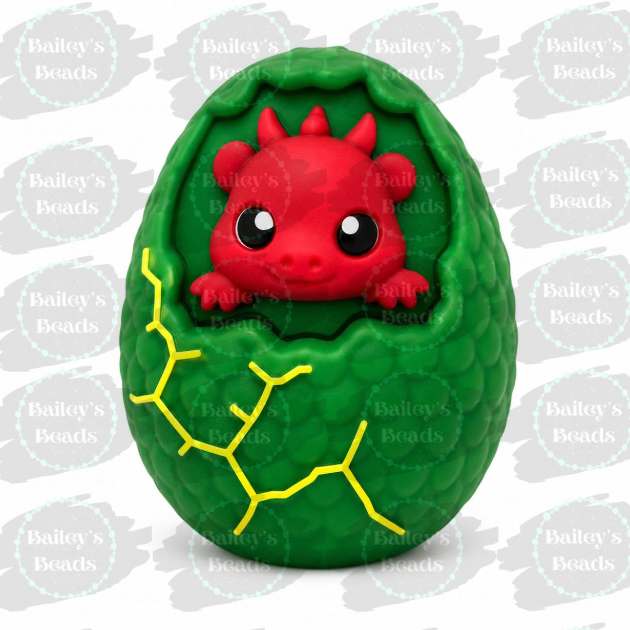 Picklez exclusive silicone focal bead featuring a cute red baby dragon hatching from a green dragon egg.