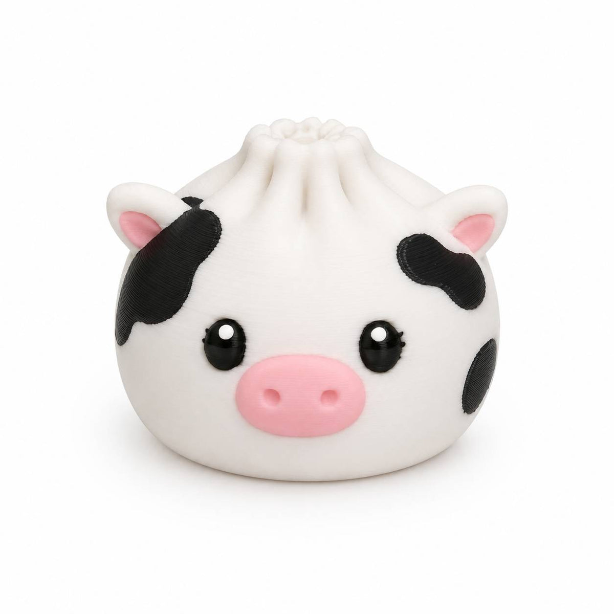 Black and white Cow Dumpling 3D printed bead with pink snout, pink ears, black spots, and cute face by Bailey’s Beads.