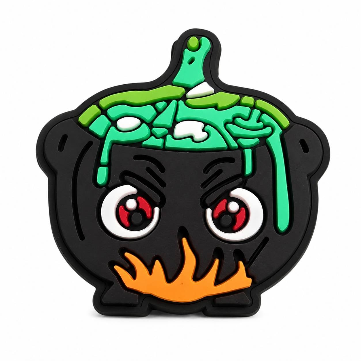 Black Halloween cauldron focal bead filled with bubbling green potion, spooky eyes, and orange flames underneath.