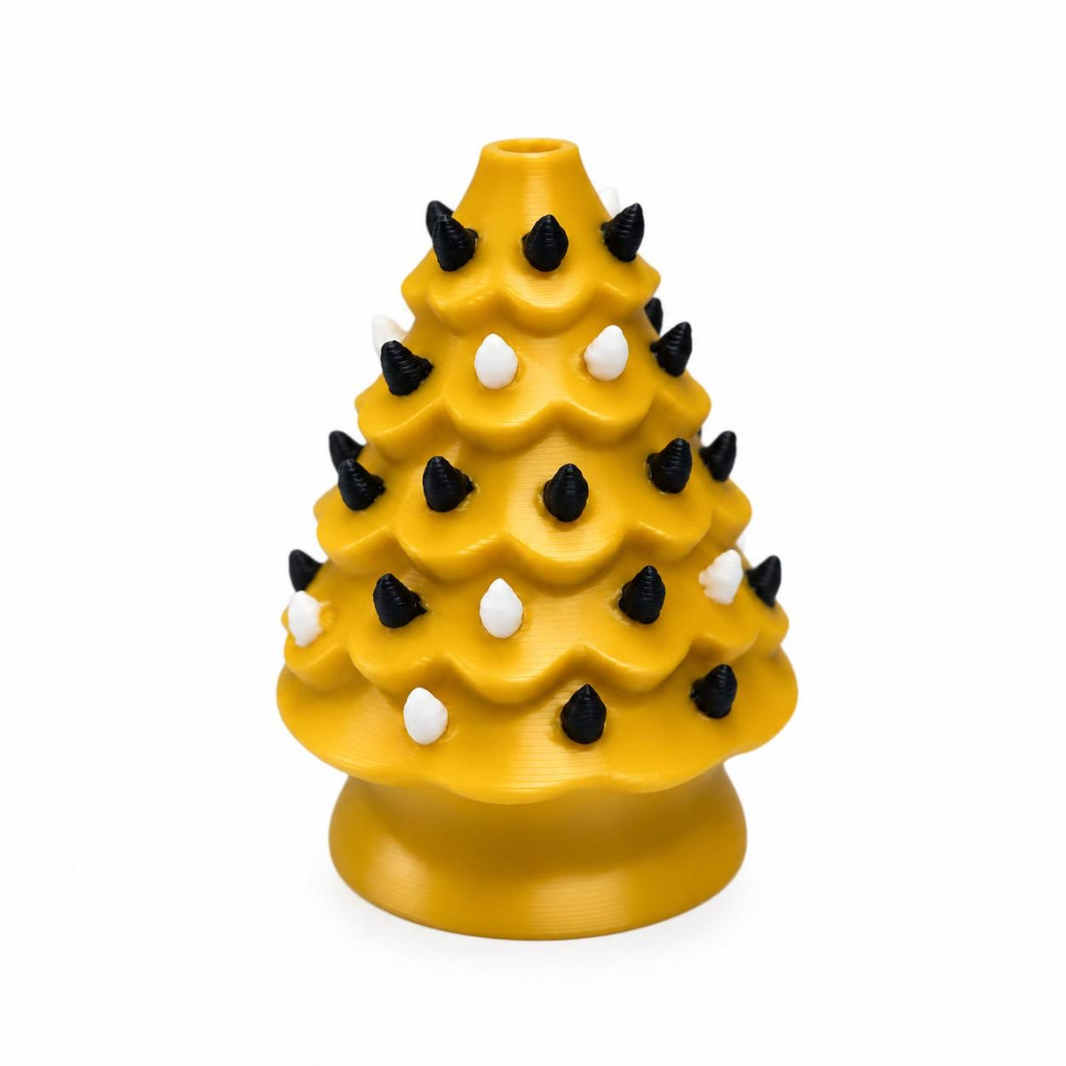 Golden Glow Christmas Tree 3D printed bead featuring a golden-yellow Christmas tree with layered branches, black and white ornaments, and a rounded tree base.