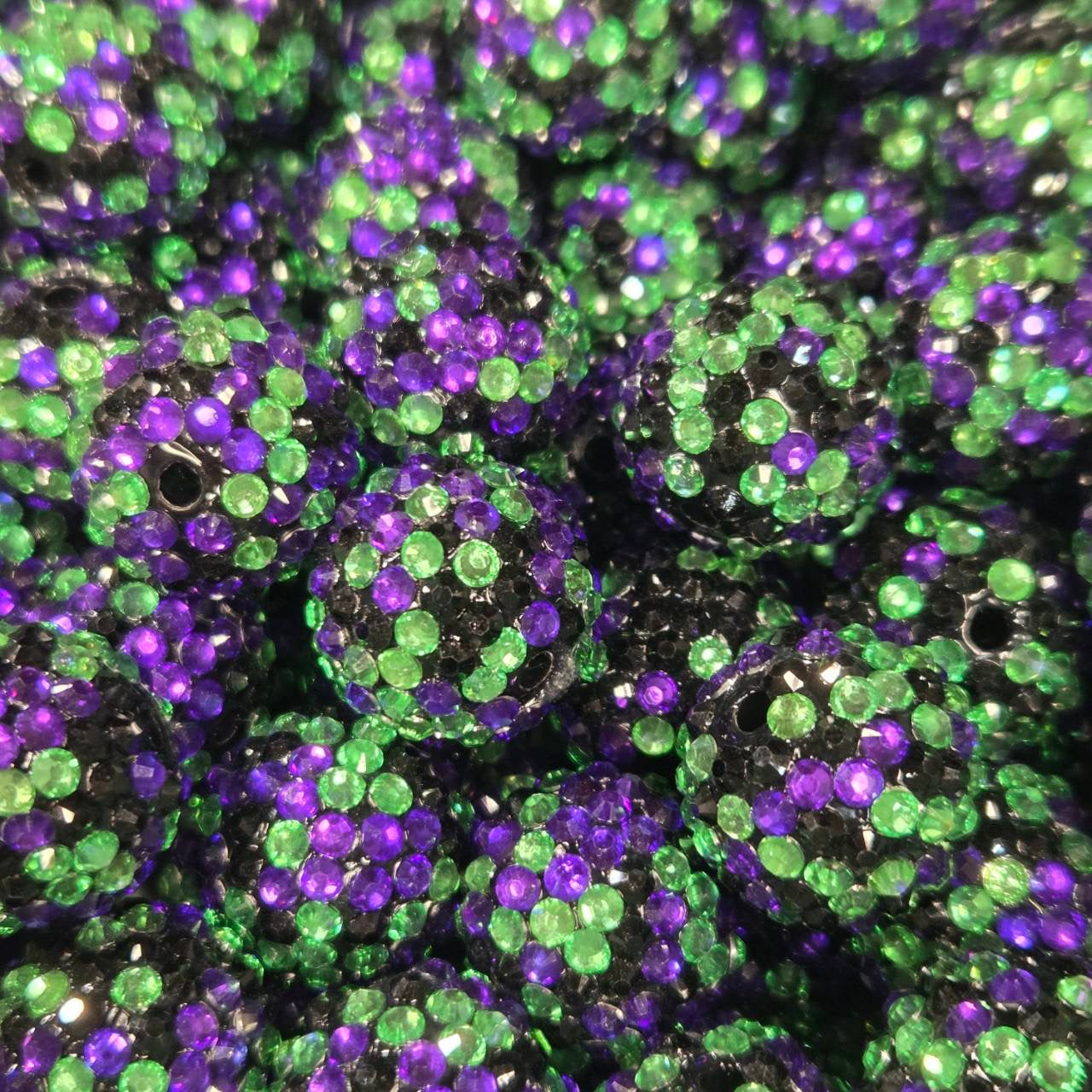 Black 20mm acrylic bead with green, purple, and black rhinestones for Halloween-themed craft projects.