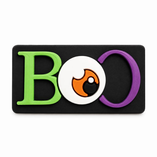 Spooky Boo silicone focal bead with green and purple lettering and a Halloween eyeball design.