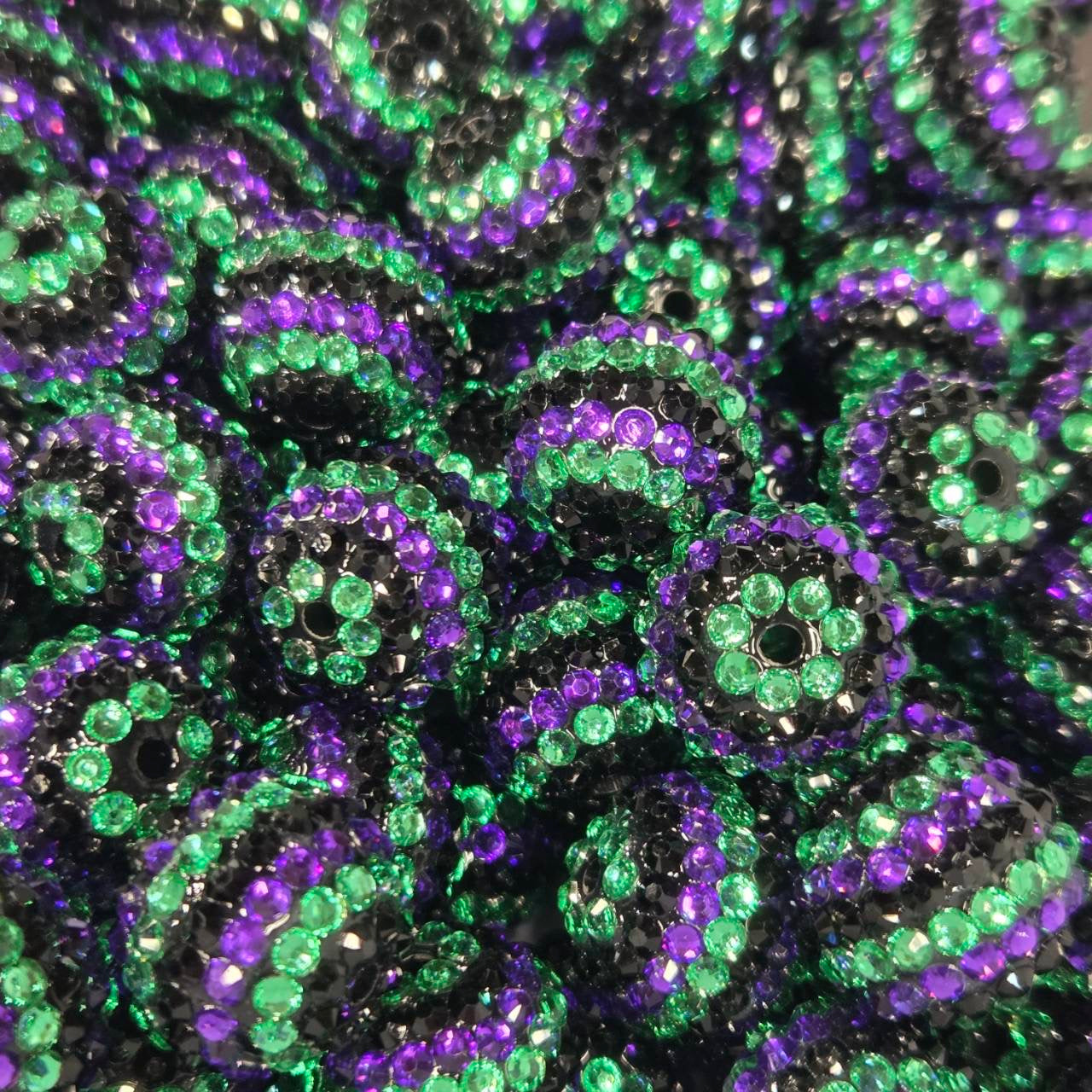 Black 20mm acrylic bead with green, purple, and black rhinestones for Halloween-themed craft projects.