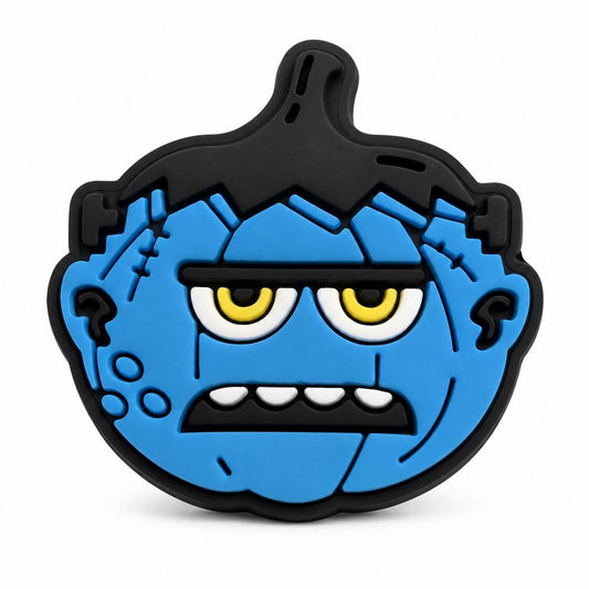 Blue Frankenstein monster Halloween focal bead featuring stitched details, bolts, and a grumpy expression.
