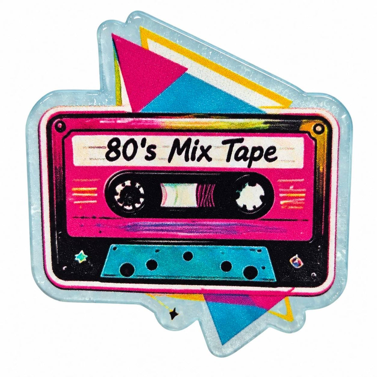 Totally Rad Mixtape acrylic flatback featuring a hot pink 80s cassette tape labeled 80's Mix Tape, colorful teal and yellow geometric shapes, and a glittery light blue border.