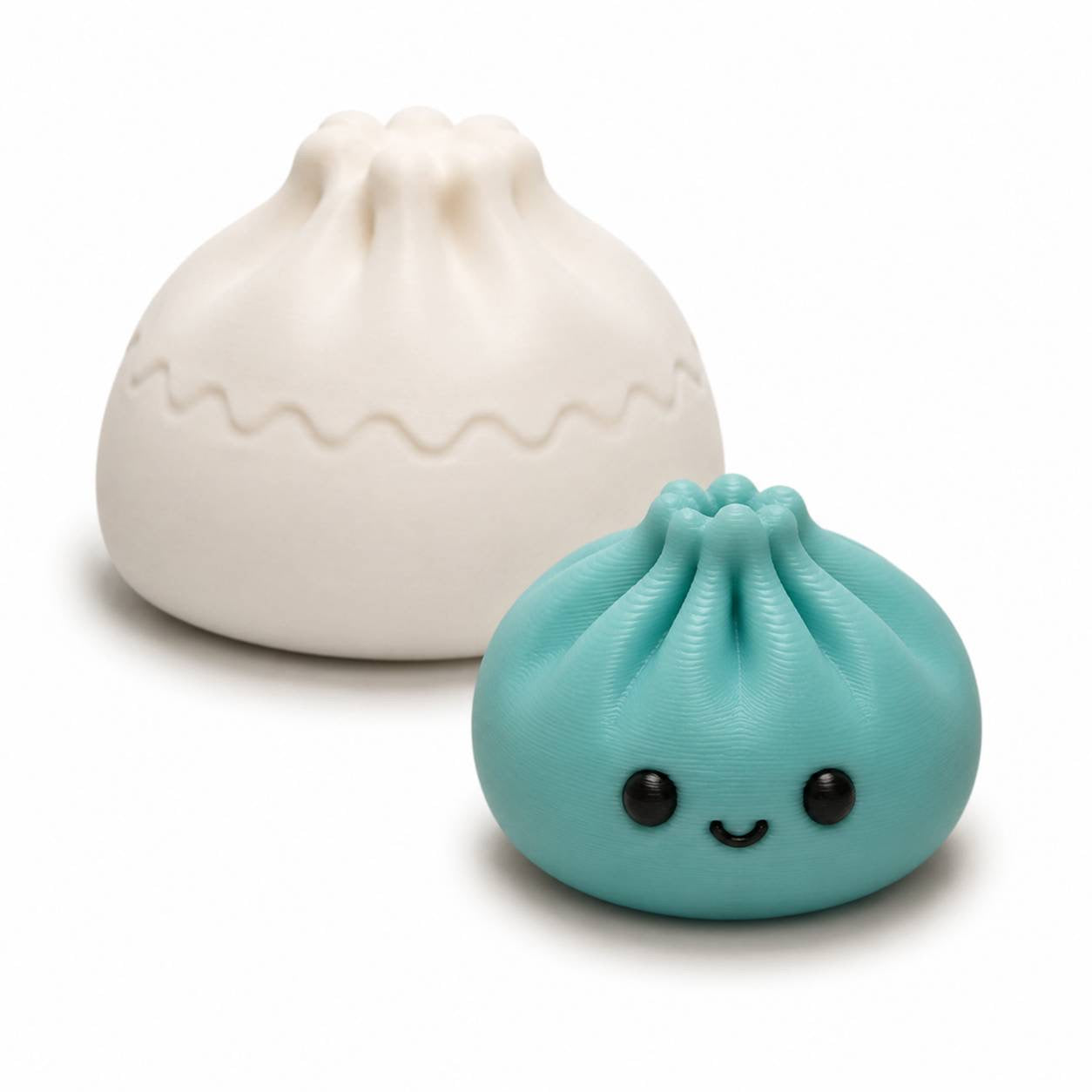 Aqua 22mm Mini Dumpling 3D printed bead shown with Original Dumpling for size comparison