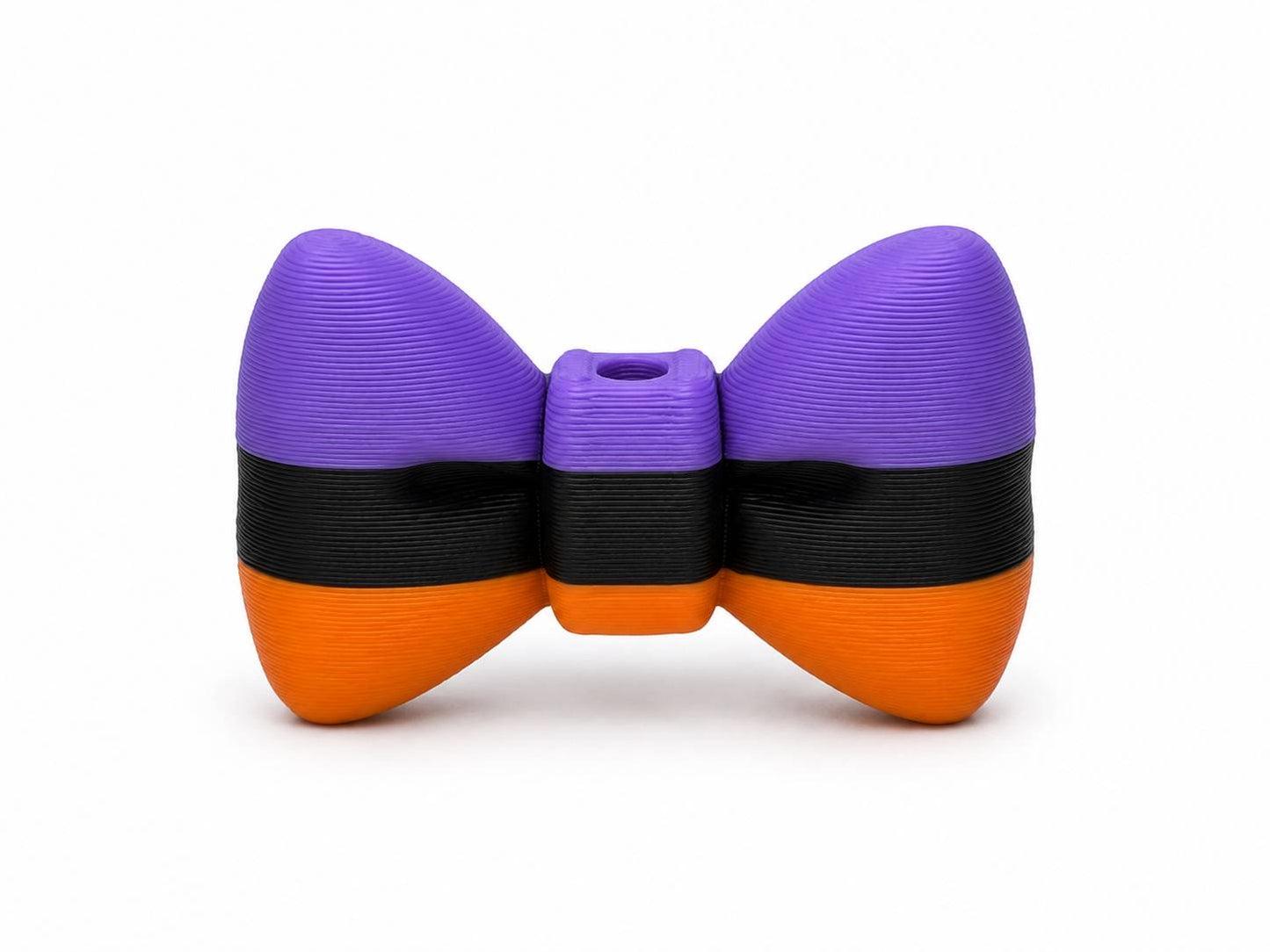 Purple, black, and orange striped 3D printed bow by Bailey's Beads for decorating Pen Palz, badge reels, keychains, ornaments, and Halloween DIY crafts.