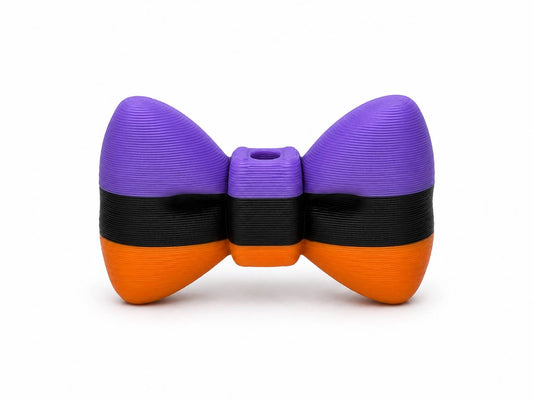 Purple, black, and orange striped 3D printed bow by Bailey's Beads for decorating Pen Palz, badge reels, keychains, ornaments, and Halloween DIY crafts.