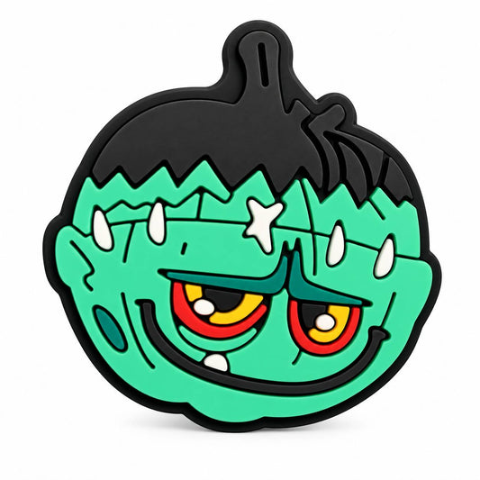 Frankenstein-inspired Halloween pumpkin focal bead featuring stitched details, spooky eyes, and a playful monster smile.