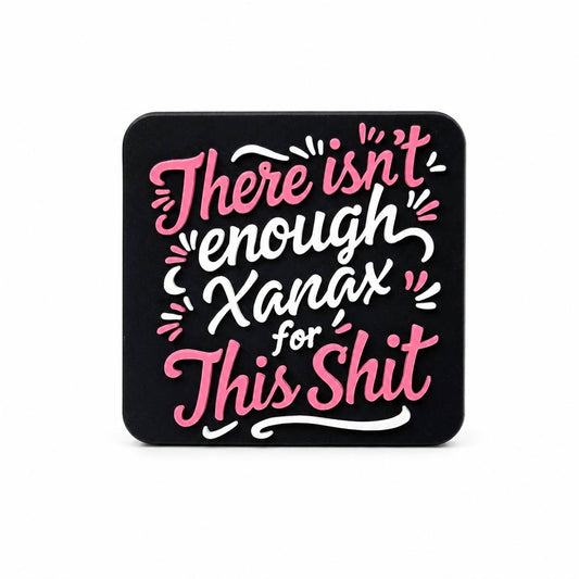 Funny silicone focal bead with the phrase There Isn't Enough Xanax for This Shit in pink and white lettering.