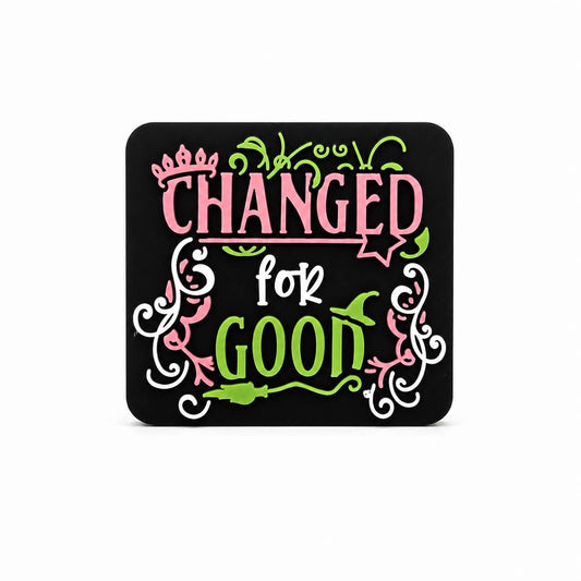 Changed For Good silicone focal bead featuring decorative lettering and magical-inspired accents on a black background.