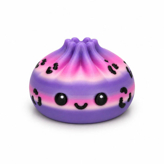 Cute Starlight Dumpling Pen Palz 3D printed bead featuring purple, pink, and white filament with black leopard accents by Bailey's Beads.