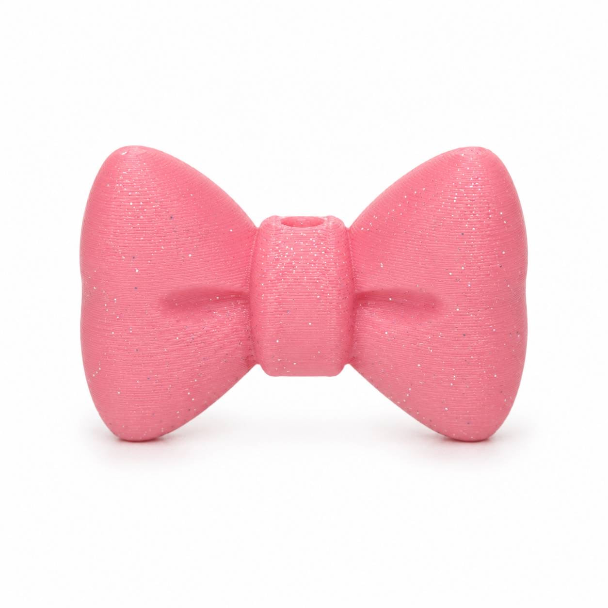 Pink Glitter 3D Printed Bow by Bailey's Beads for decorating Pen Palz, badge reels, keychains, ornaments, and DIY craft projects.