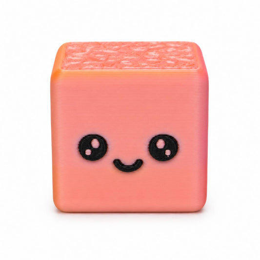 Cute Cube Palz 3D printed bead featuring a smiling kawaii face and textured top by Bailey's Beads.