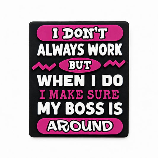 Funny office-themed silicone focal bead with the quote "I Don't Always Work, But When I Do I Make Sure My Boss Is Around" in black, white, and pink.