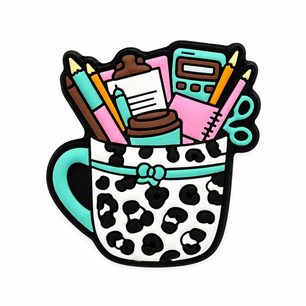 White leopard print coffee mug silicone focal bead filled with office and crafting supplies, including pencils, scissors, calculator, clipboard, and notebook by Bailey's Beads.