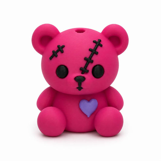 Hot pink Blossom Patch Pen Palz 3D printed teddy bear bead with embroidered-inspired stitched details and a purple heart by Bailey's Beads for beadable pens, keychains, badge reels, and DIY crafts.