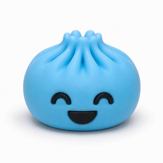 Blue Happy Dumpling Pen Palz 3D printed bead with a cheerful kawaii smile and closed happy eyes.