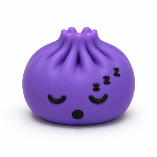 Purple Sleepy Dumpling Pen Palz 3D printed bead with closed eyes, tiny Zzz details, and a kawaii sleeping expression.